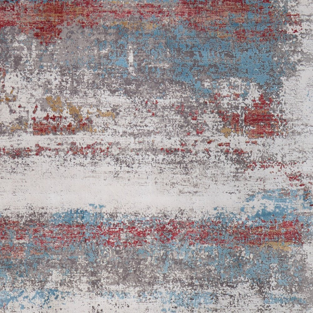 3' X 5' Gray Blue and Red Abstract Power Loom Area Rug With Fringe