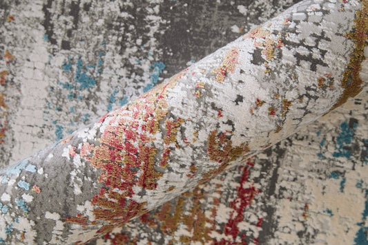 5' X 8' Gray Blue and Red Abstract Power Loom Area Rug With Fringe