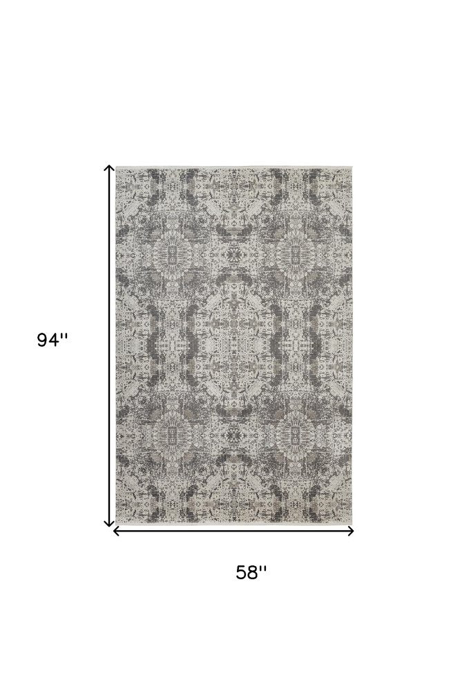 5' X 8' Ivory Taupe and Gray Abstract Power Loom Distressed Area Rug With Fringe