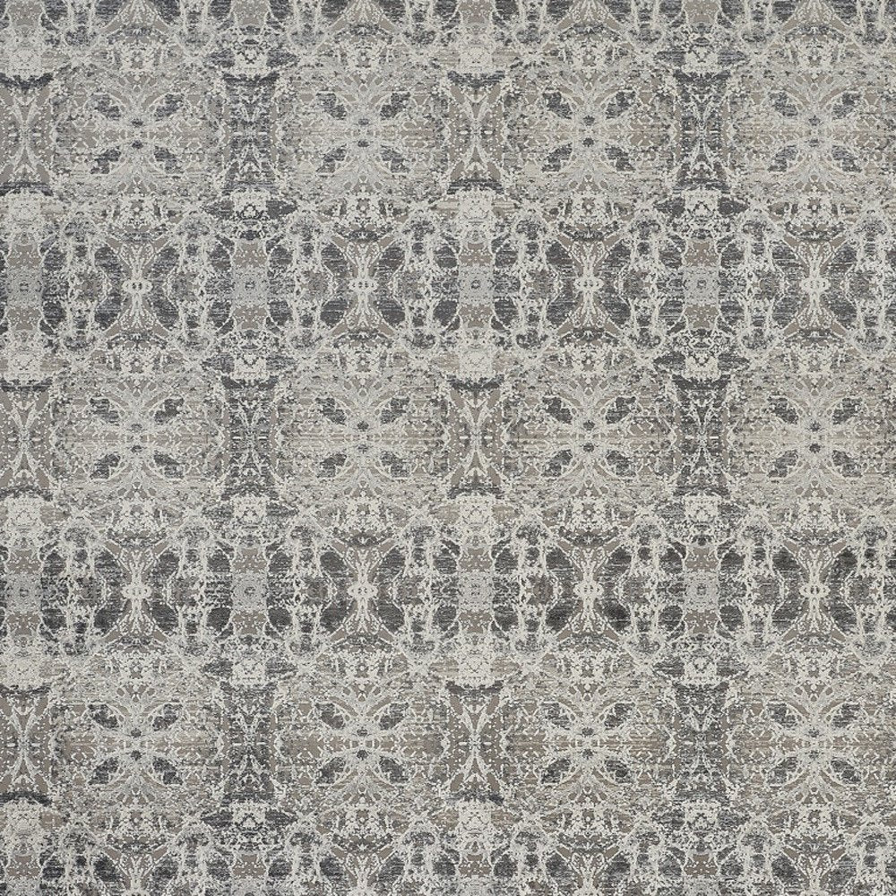 5' X 8' Ivory Taupe and Gray Oriental Power Loom Area Rug With Fringe