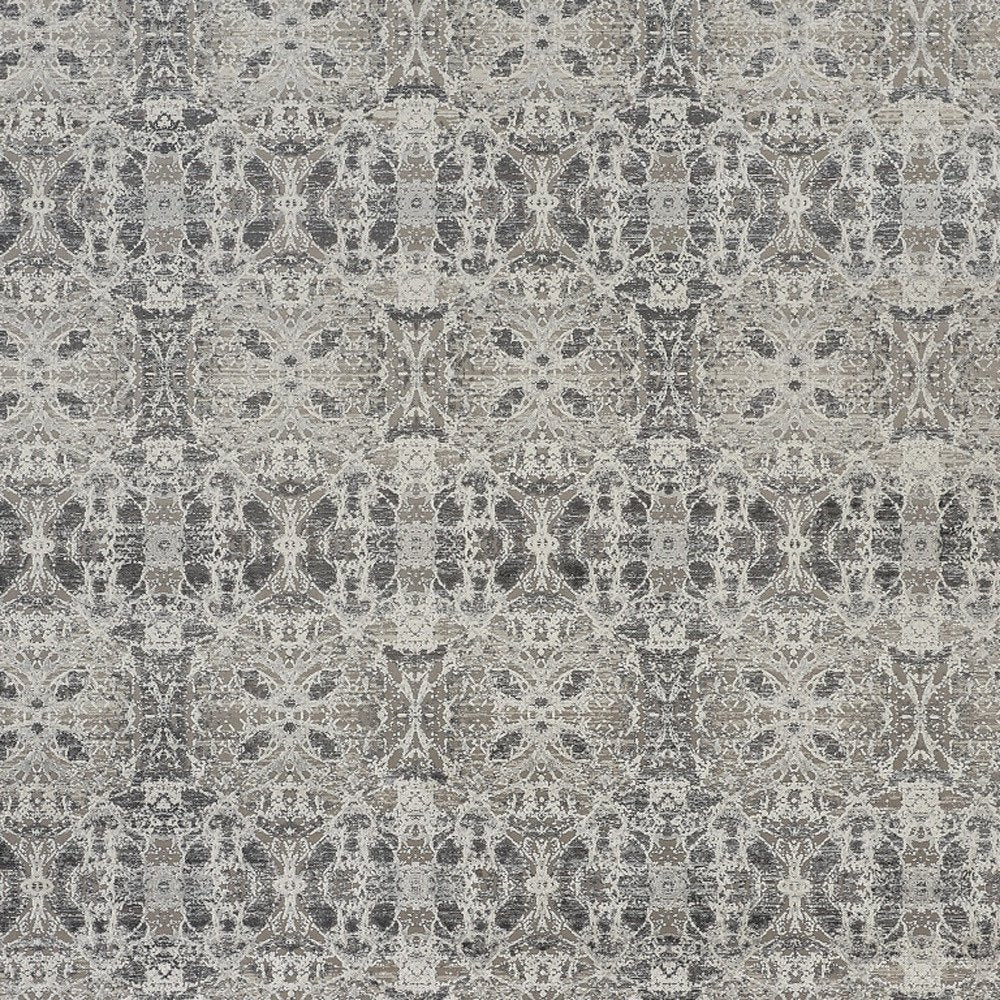 5' X 8' Ivory Taupe and Gray Oriental Power Loom Area Rug With Fringe