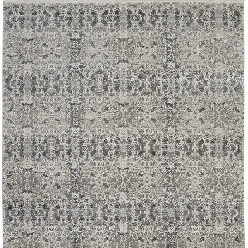 5' X 8' Ivory Taupe and Gray Oriental Power Loom Area Rug With Fringe