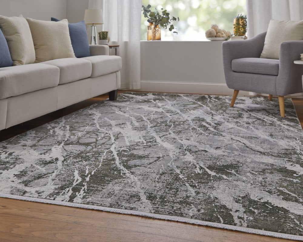 3' X 5' Taupe and Gray Abstract Power Loom Area Rug With Fringe