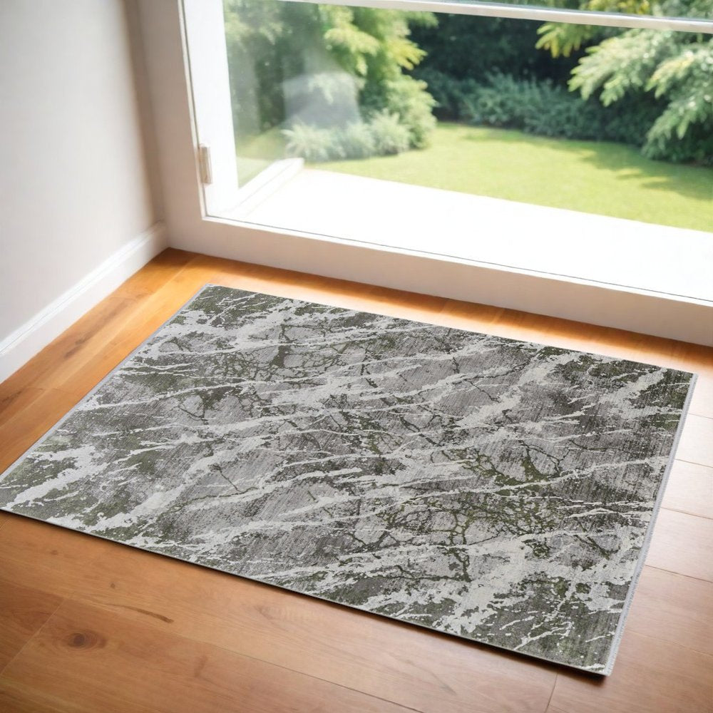 3' X 5' Taupe and Gray Abstract Power Loom Area Rug With Fringe