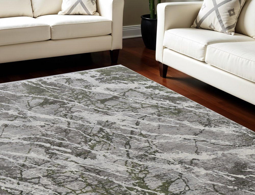 3' X 5' Taupe and Gray Abstract Power Loom Area Rug With Fringe