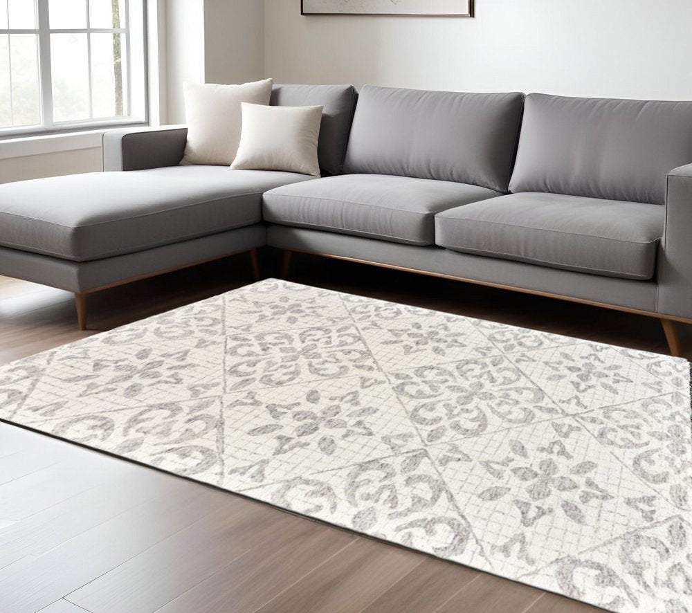 8' X 10' Ivory and Gray Wool Floral Hand Tufted Area Rug