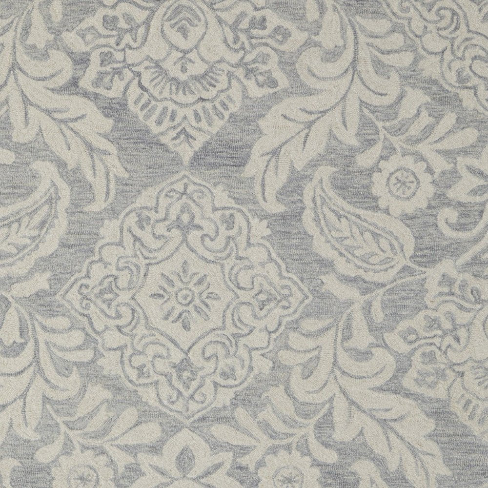 10' X 14' Blue and Ivory Wool Oriental Hand Tufted Area Rug