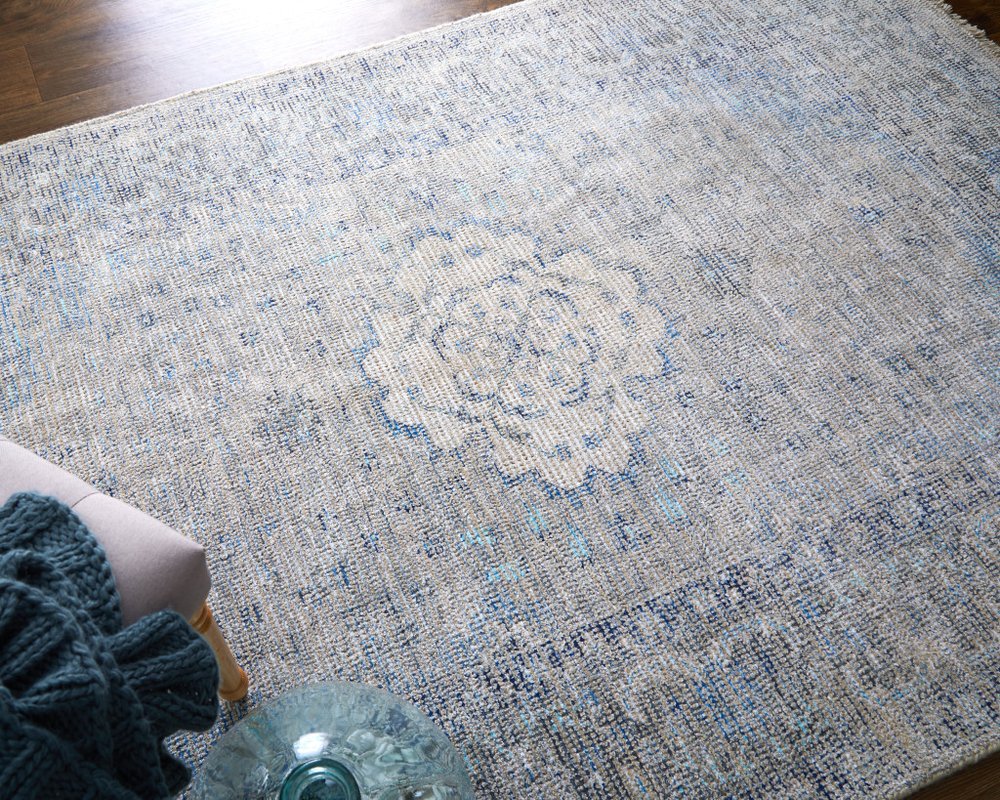 5' X 8' Gray Blue and Ivory Oriental Hand Woven Distressed Area Rug With Fringe