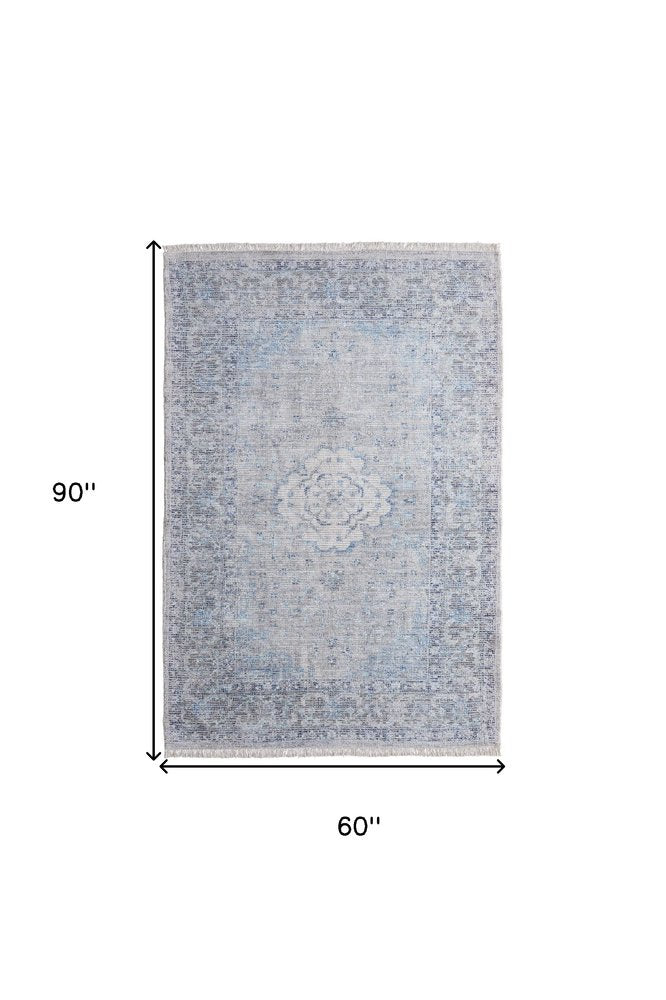 5' X 8' Gray Blue and Ivory Oriental Hand Woven Distressed Area Rug With Fringe