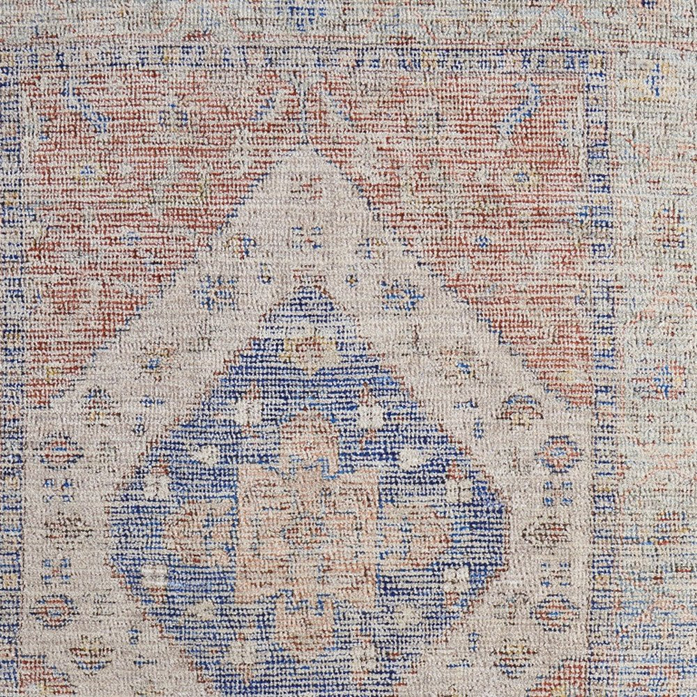 9' X 12' Red Blue and Ivory Abstract Hand Woven Distressed Area Rug With Fringe