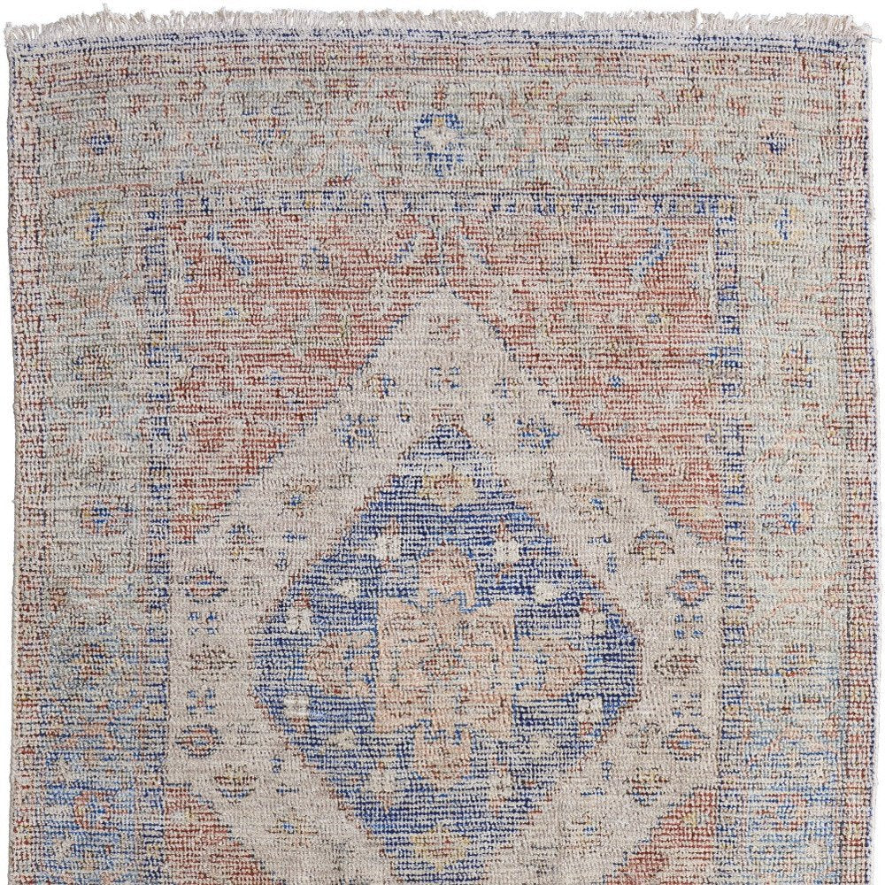 9' X 12' Red Blue and Ivory Abstract Hand Woven Distressed Area Rug With Fringe