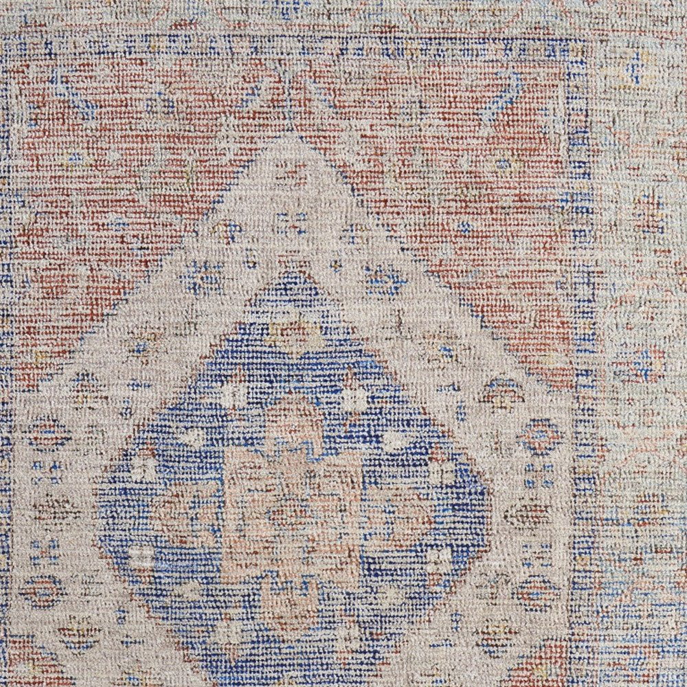 9' X 12' Red Blue and Ivory Abstract Hand Woven Distressed Area Rug With Fringe