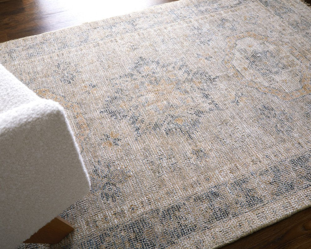 4' X 6' Tan and Gray Oriental Hand Woven Distressed Area Rug With Fringe