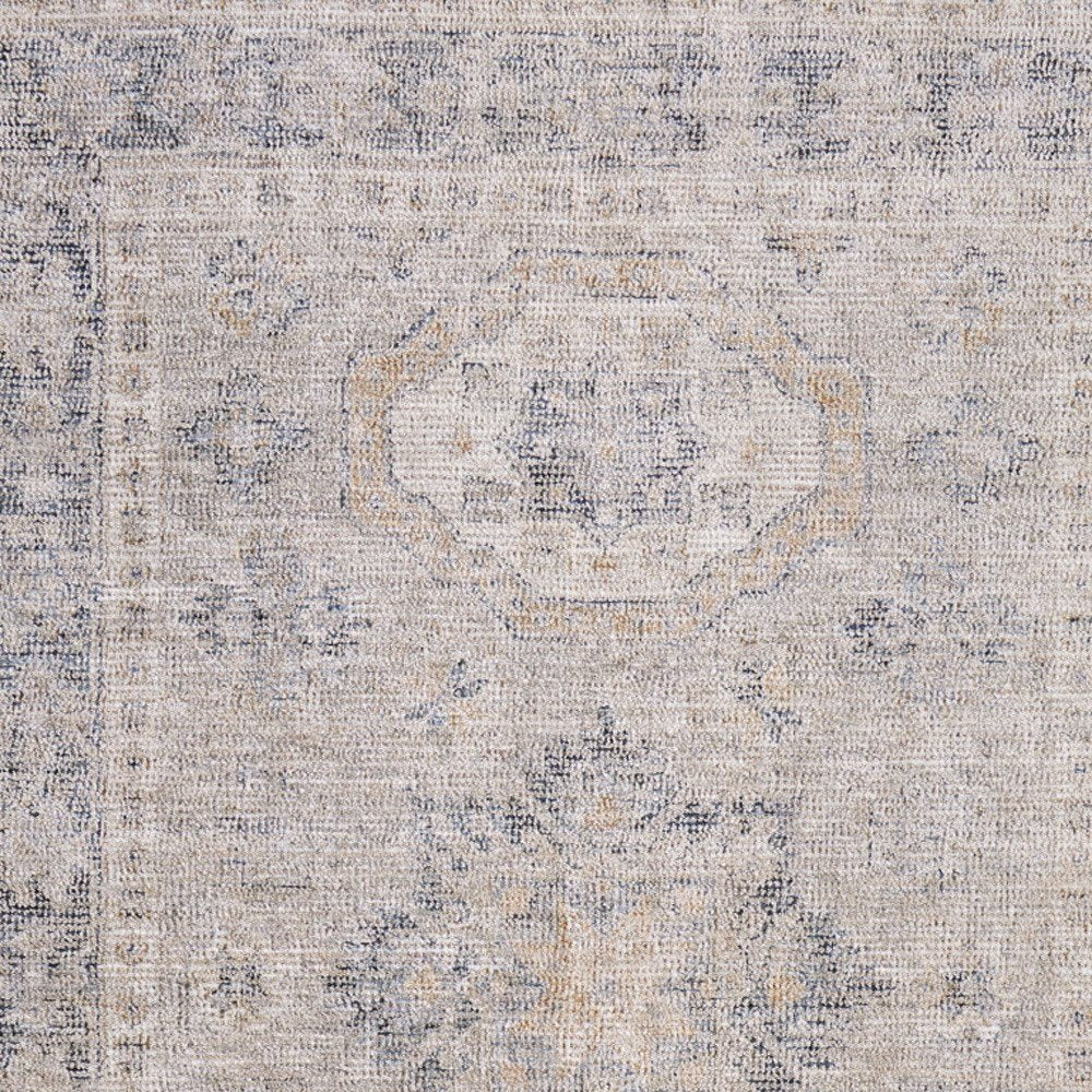 4' X 6' Tan and Gray Oriental Hand Woven Distressed Area Rug With Fringe
