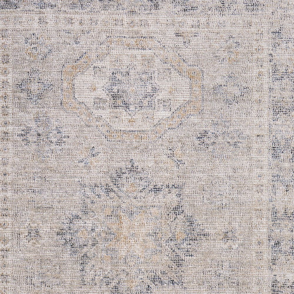 4' X 6' Tan and Gray Oriental Hand Woven Distressed Area Rug With Fringe