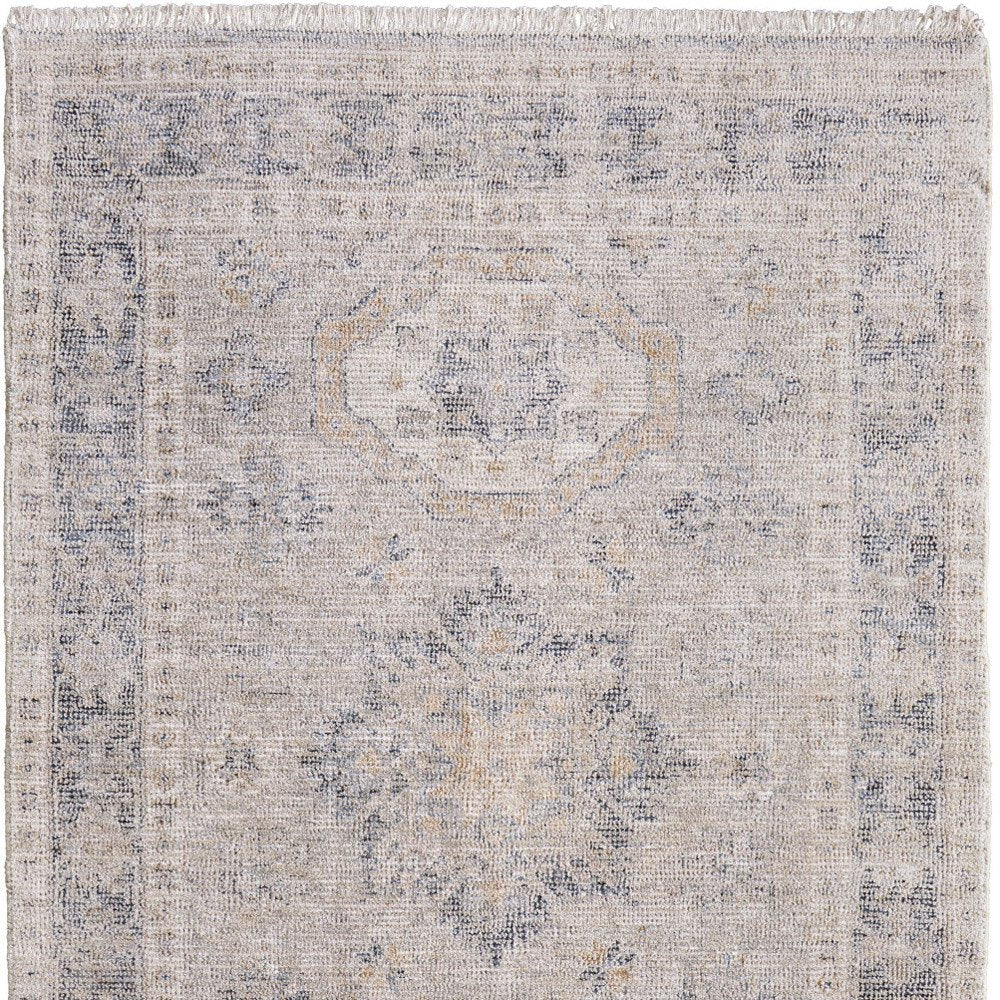 4' X 6' Tan and Gray Oriental Hand Woven Distressed Area Rug With Fringe