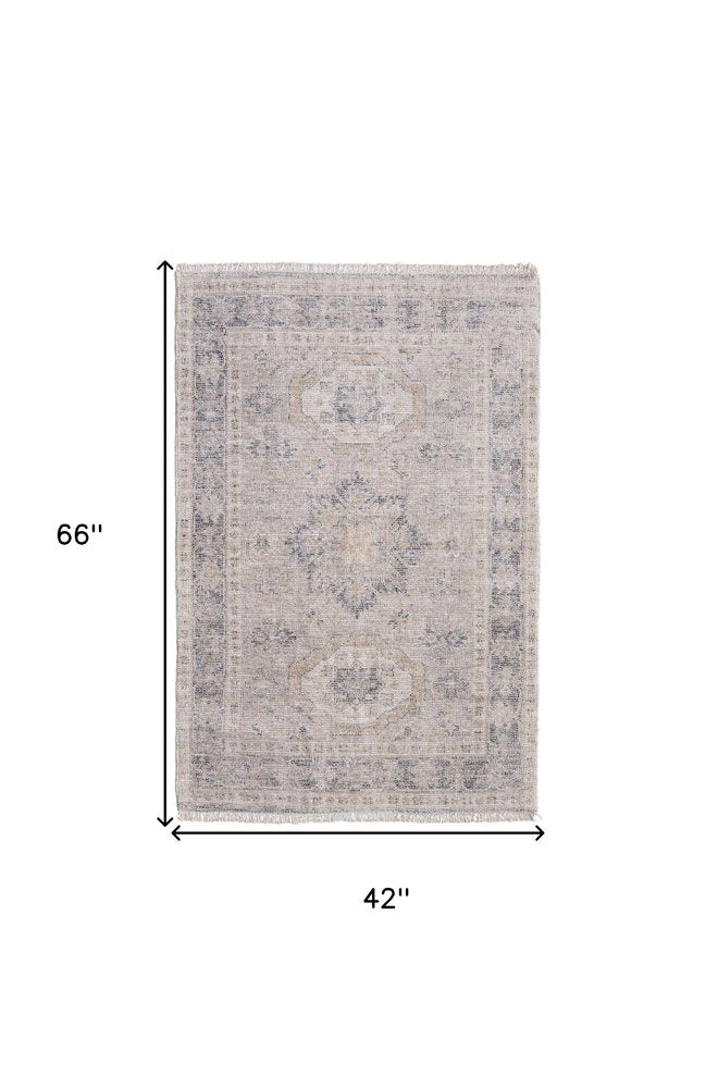 4' X 6' Tan and Gray Oriental Hand Woven Distressed Area Rug With Fringe
