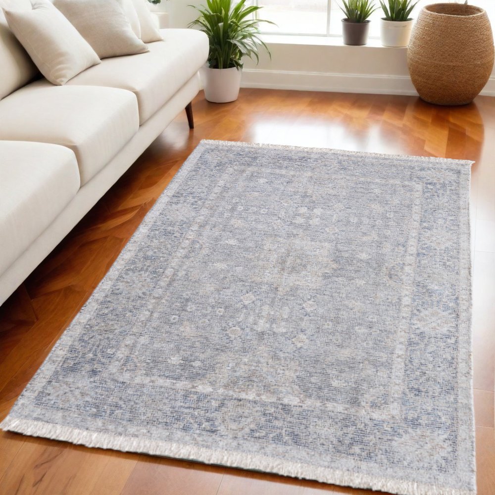 4' X 6' Gray Blue and Taupe Abstract Hand Woven Distressed Area Rug With Fringe