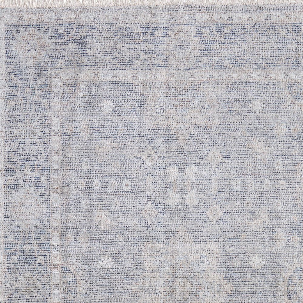 4' X 6' Gray Blue and Taupe Abstract Hand Woven Distressed Area Rug With Fringe