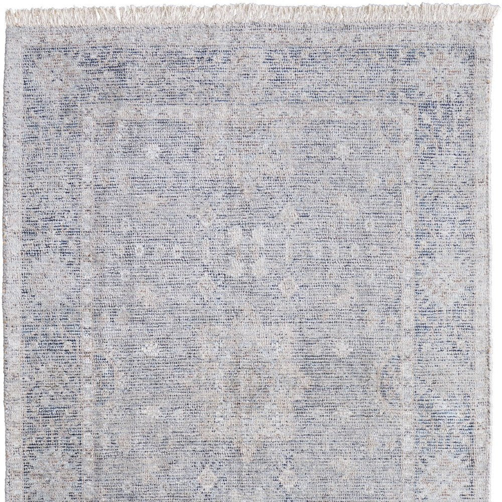 4' X 6' Gray Blue and Taupe Abstract Hand Woven Distressed Area Rug With Fringe