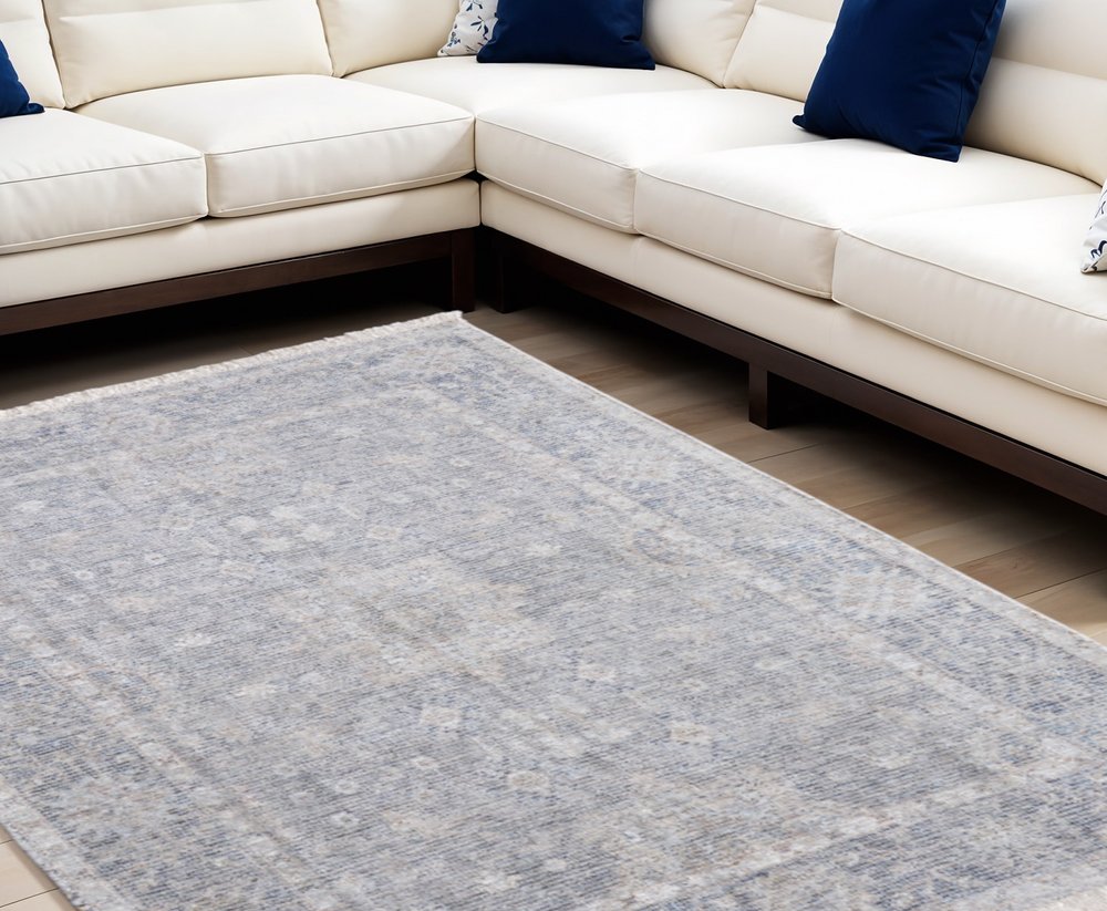 4' X 6' Gray Blue and Taupe Abstract Hand Woven Distressed Area Rug With Fringe