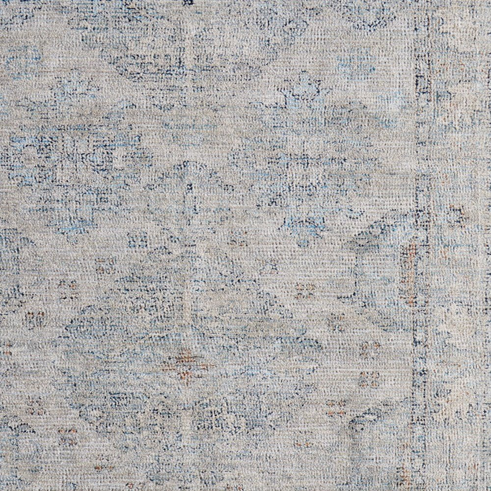 4' X 6' Gray Blue and Taupe Oriental Hand Woven Distressed Area Rug With Fringe