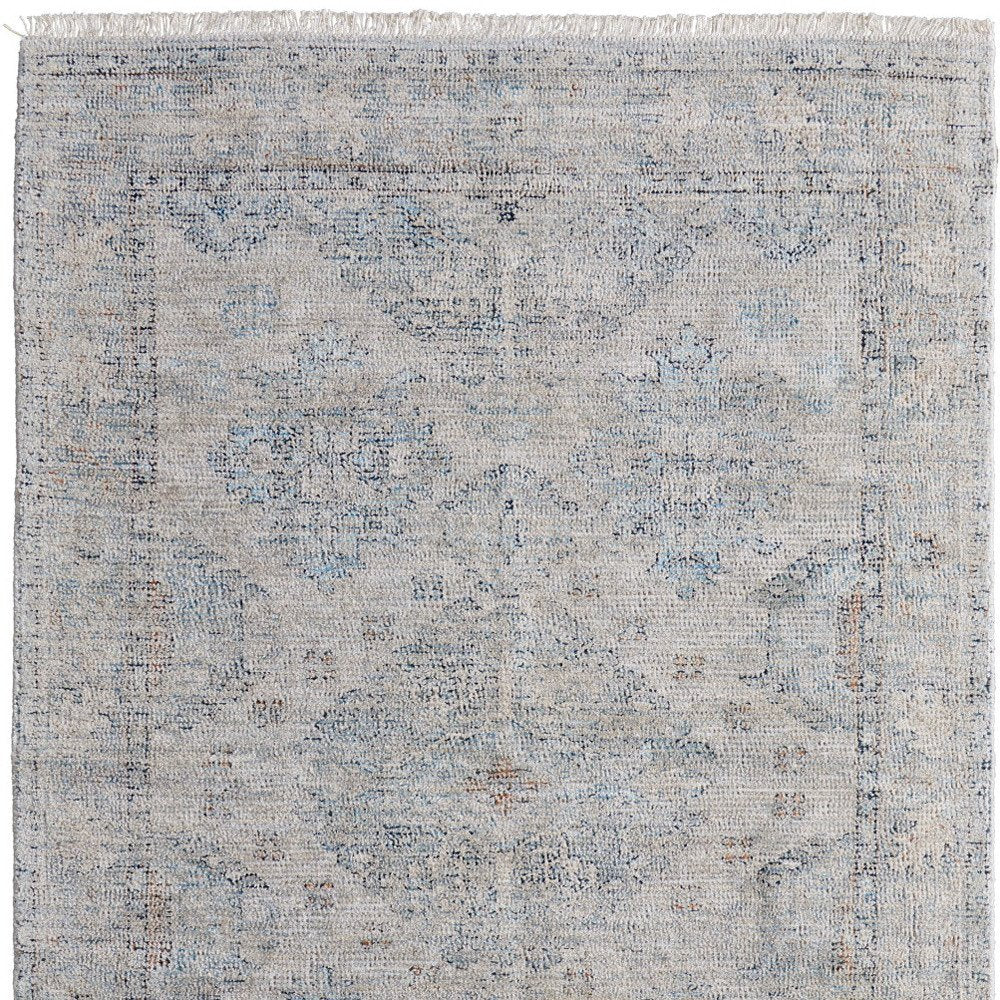 4' X 6' Gray Blue and Taupe Oriental Hand Woven Distressed Area Rug With Fringe