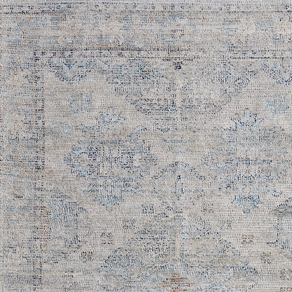 4' X 6' Gray Blue and Taupe Oriental Hand Woven Distressed Area Rug With Fringe