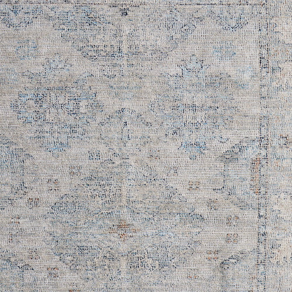 4' X 6' Gray Blue and Taupe Oriental Hand Woven Distressed Area Rug With Fringe