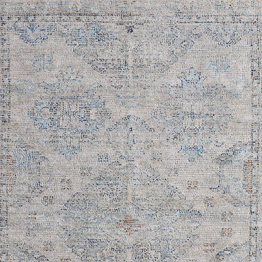 4' X 6' Gray Blue and Taupe Oriental Hand Woven Distressed Area Rug With Fringe