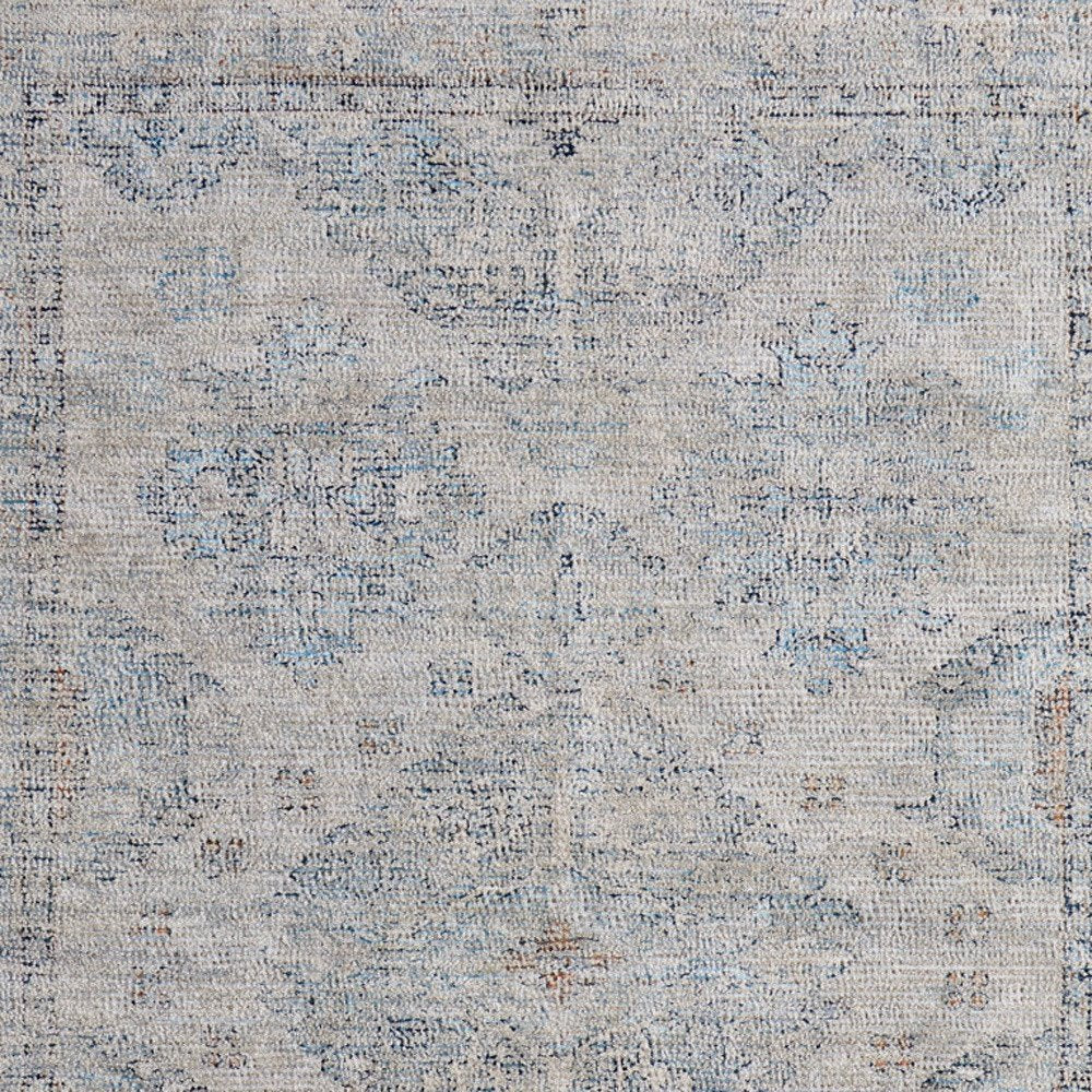 4' X 6' Gray Blue and Taupe Oriental Hand Woven Distressed Area Rug With Fringe