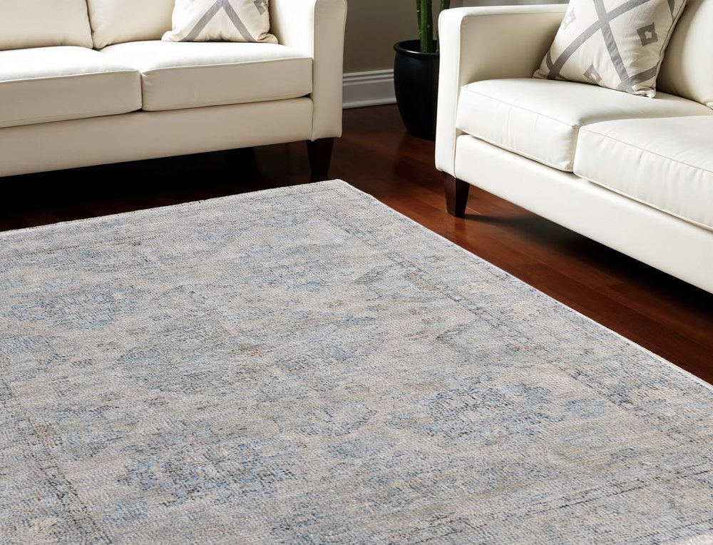 4' X 6' Gray Blue and Taupe Oriental Hand Woven Distressed Area Rug With Fringe