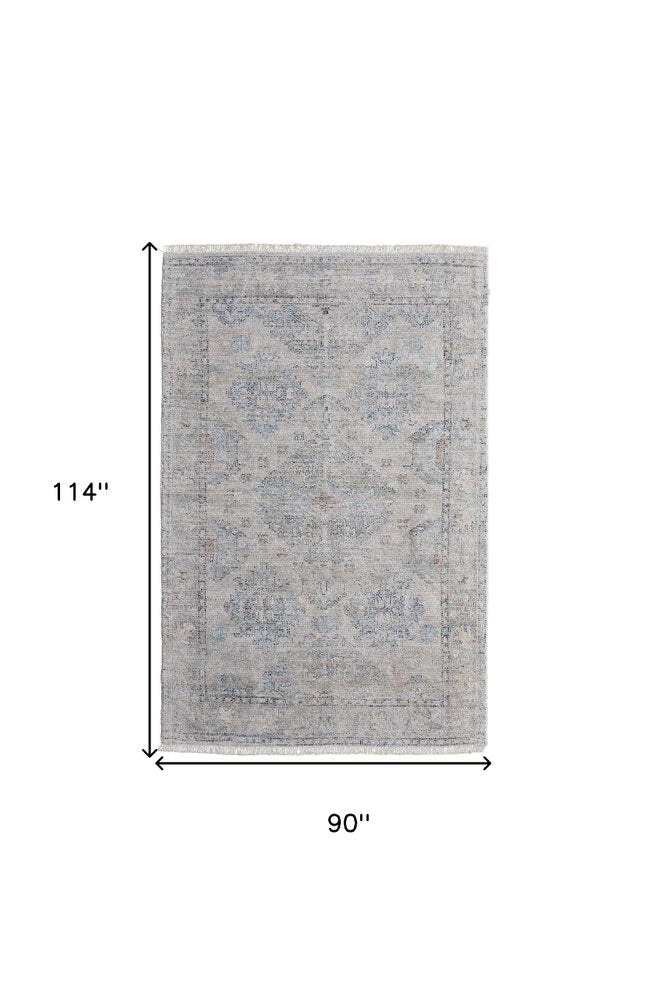 4' X 6' Gray Blue and Taupe Oriental Hand Woven Distressed Area Rug With Fringe