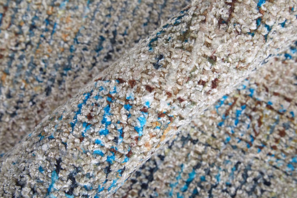 4' X 6' Gray Blue and Tan Abstract Hand Woven Distressed Area Rug With Fringe