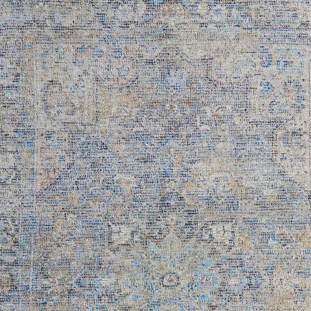 4' X 6' Gray Blue and Tan Abstract Hand Woven Distressed Area Rug With Fringe