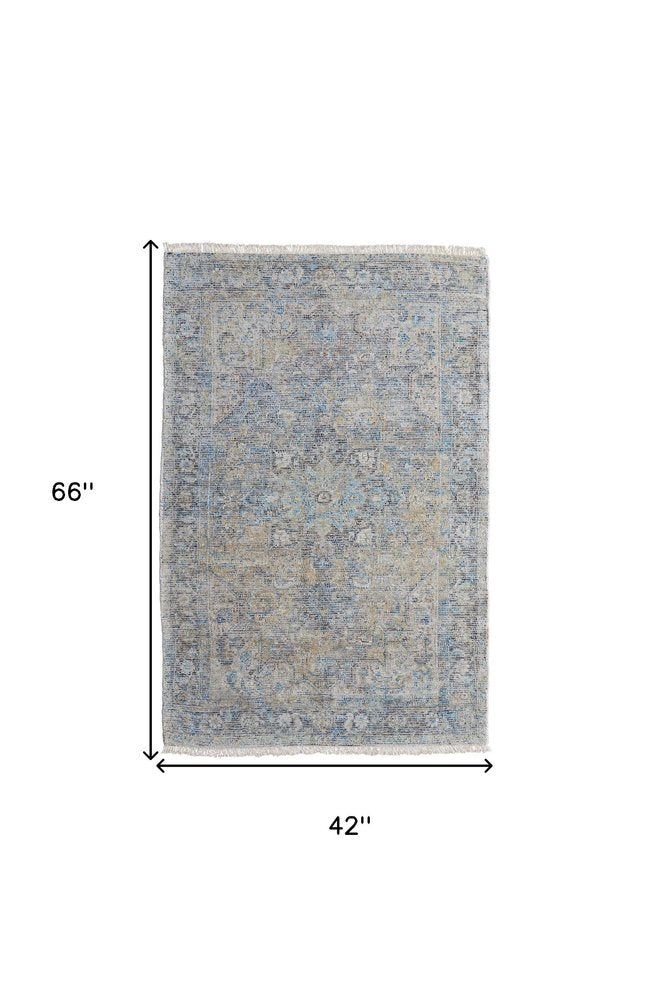 4' X 6' Gray Blue and Tan Abstract Hand Woven Distressed Area Rug With Fringe