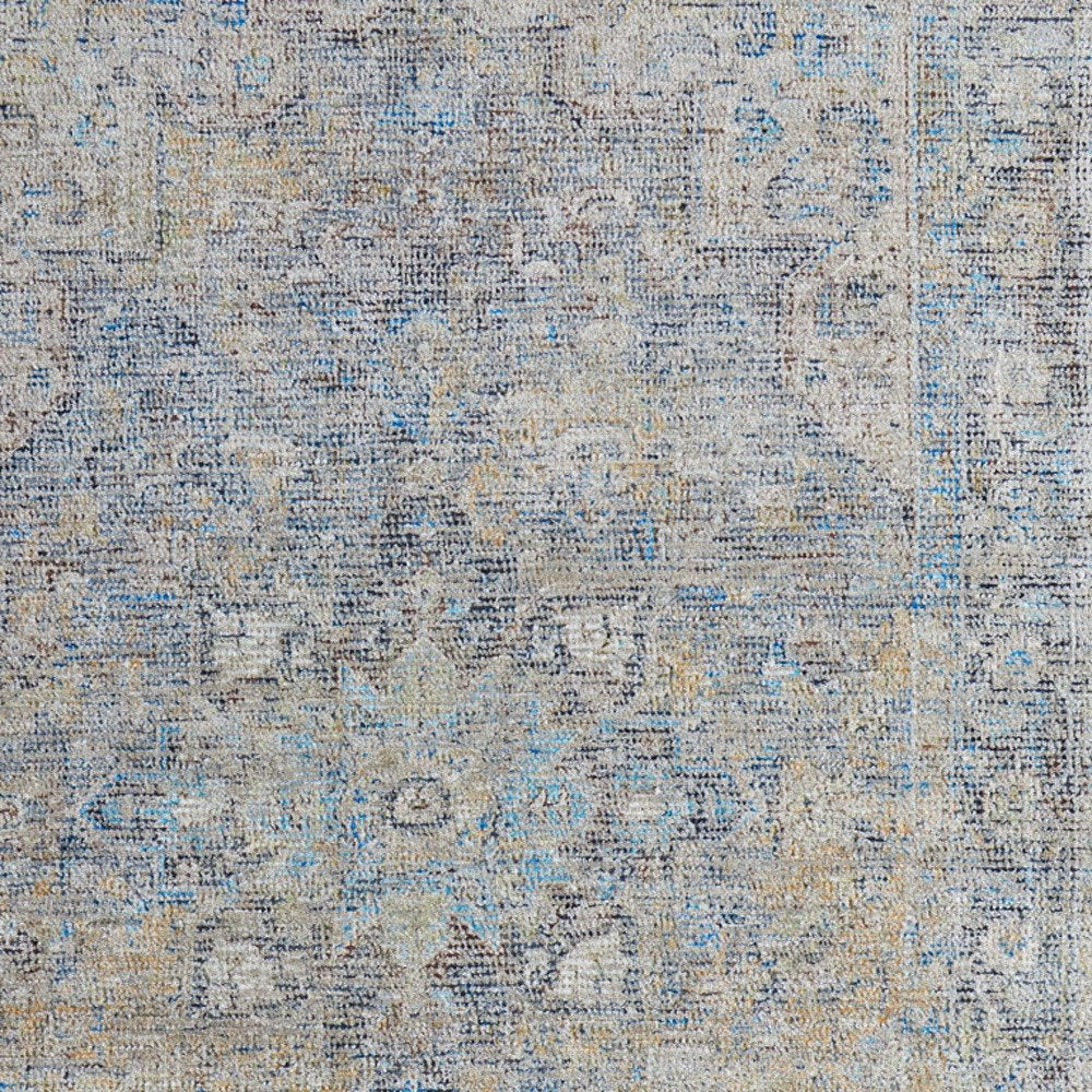4' X 6' Gray Blue and Tan Abstract Hand Woven Distressed Area Rug With Fringe