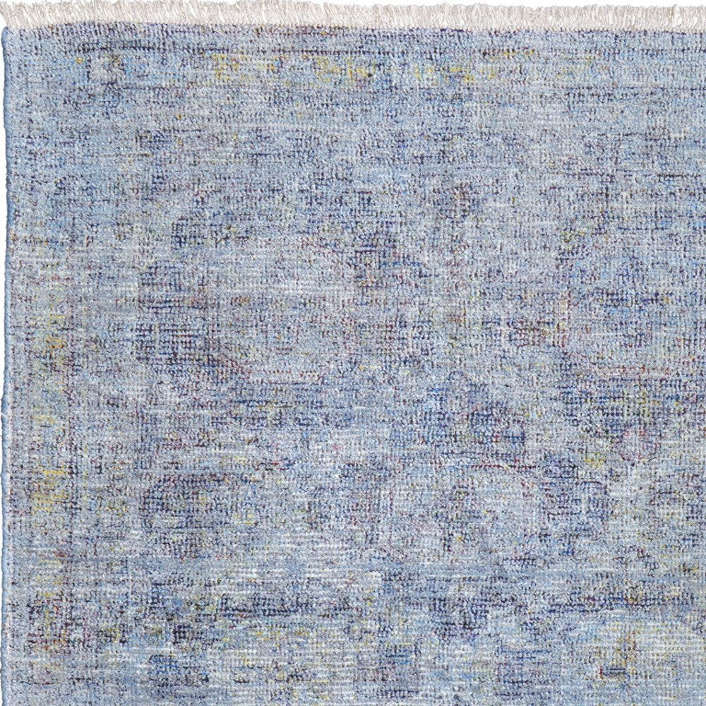 4' X 6' Blue and Ivory Abstract Hand Woven Distressed Area Rug With Fringe