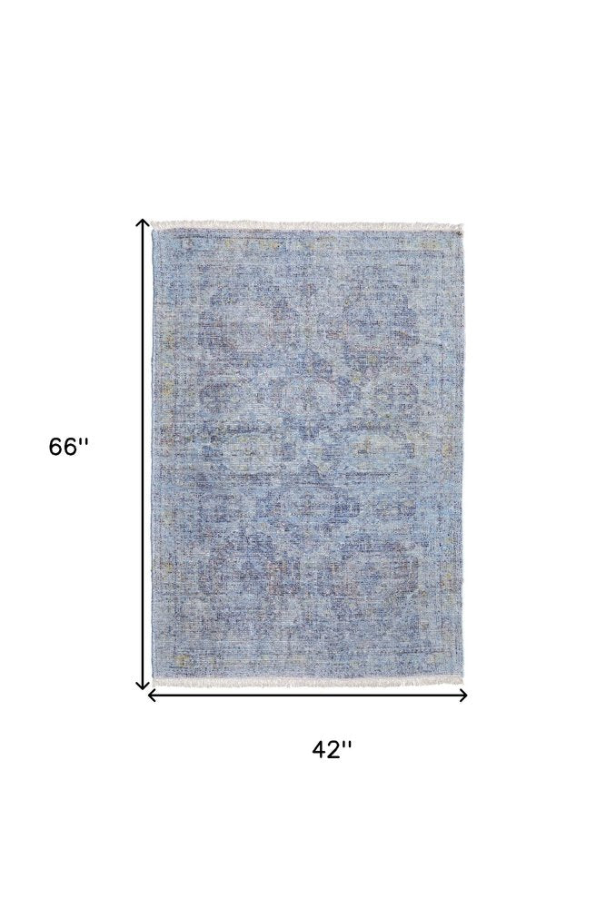 4' X 6' Blue and Ivory Abstract Hand Woven Distressed Area Rug With Fringe
