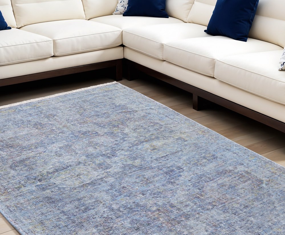 4' X 6' Blue and Ivory Abstract Hand Woven Distressed Area Rug With Fringe