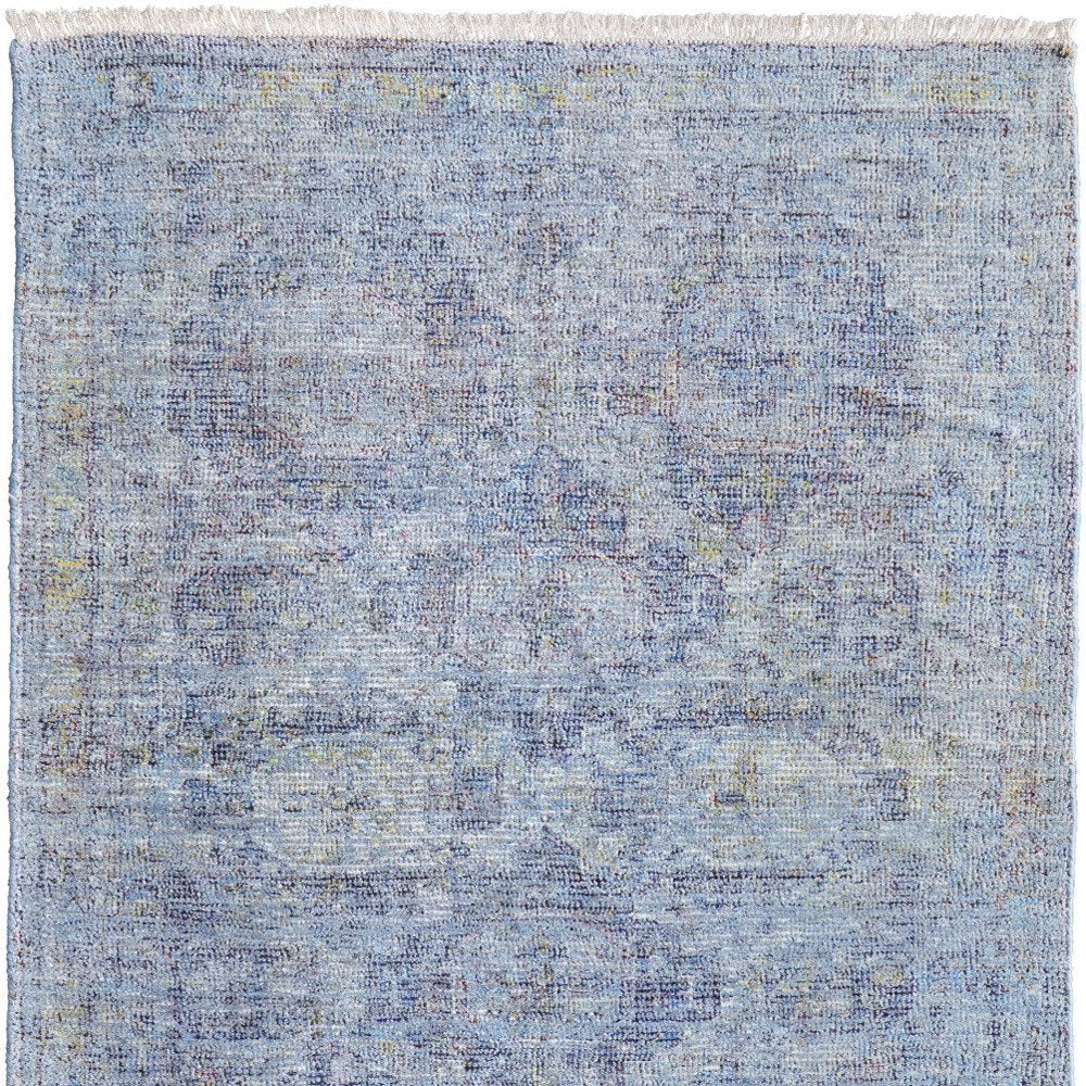 4' X 6' Blue and Ivory Abstract Hand Woven Distressed Area Rug With Fringe