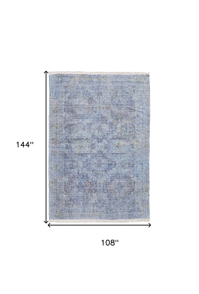 4' X 6' Blue and Ivory Abstract Hand Woven Distressed Area Rug With Fringe