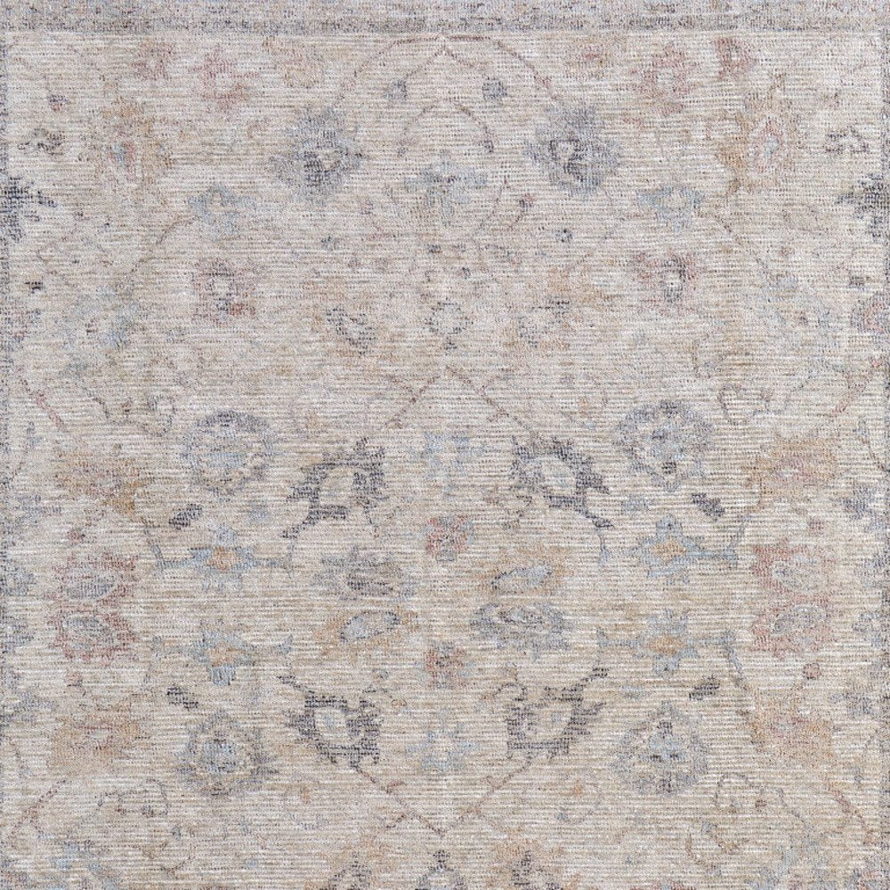 4' X 6' Ivory Tan and Blue Floral Hand Woven Distressed Area Rug With Fringe
