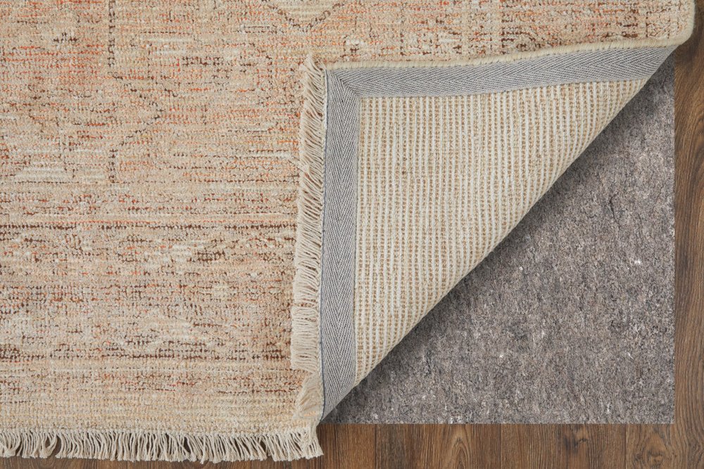 4' X 6' Tan Orange and Ivory Oriental Hand Woven Distressed Area Rug With Fringe