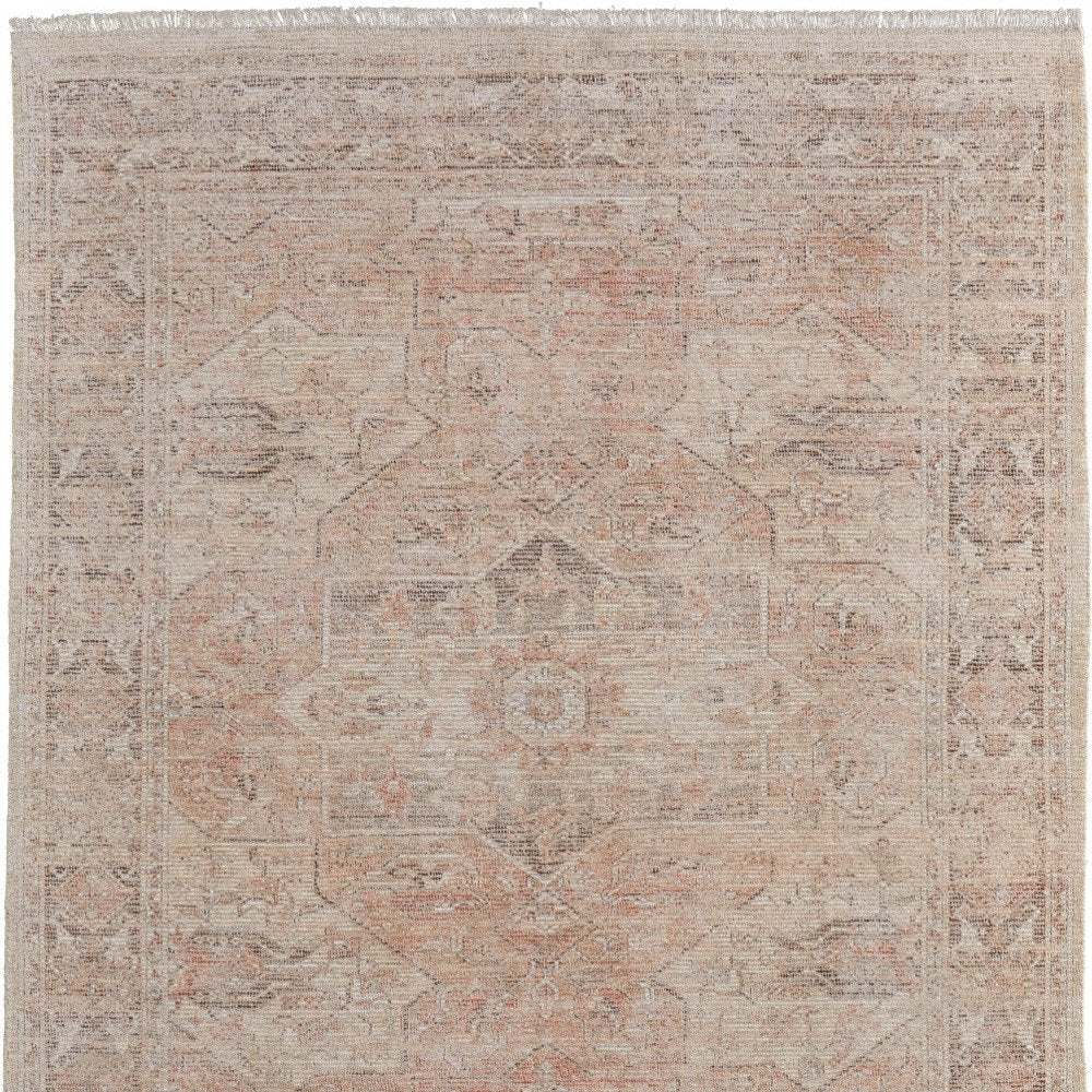 4' X 6' Tan Orange and Ivory Oriental Hand Woven Distressed Area Rug With Fringe
