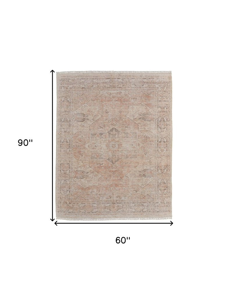 4' X 6' Tan Orange and Ivory Oriental Hand Woven Distressed Area Rug With Fringe