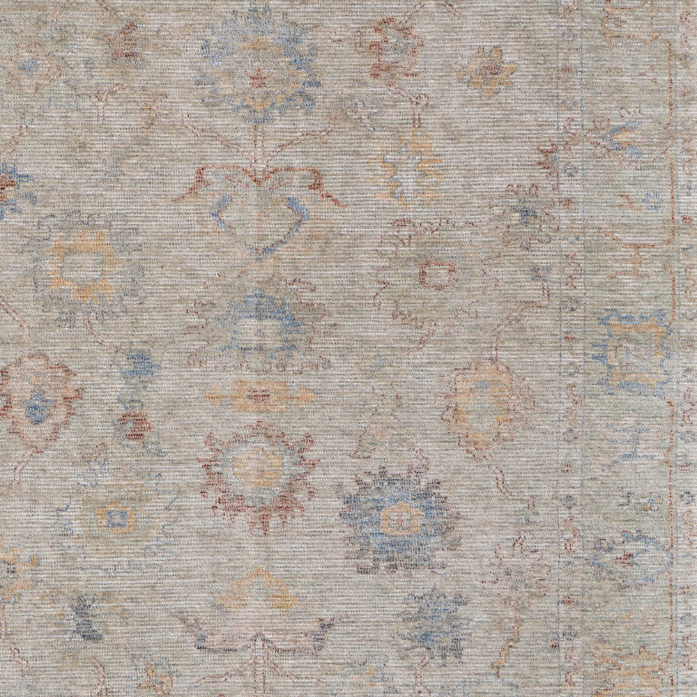 4' X 6' Tan Brown and Blue Floral Hand Woven Distressed Area Rug With Fringe