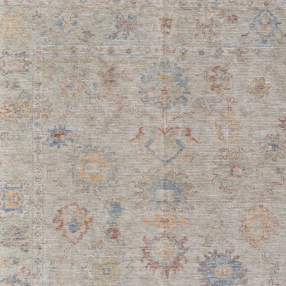 4' X 6' Tan Brown and Blue Floral Hand Woven Distressed Area Rug With Fringe