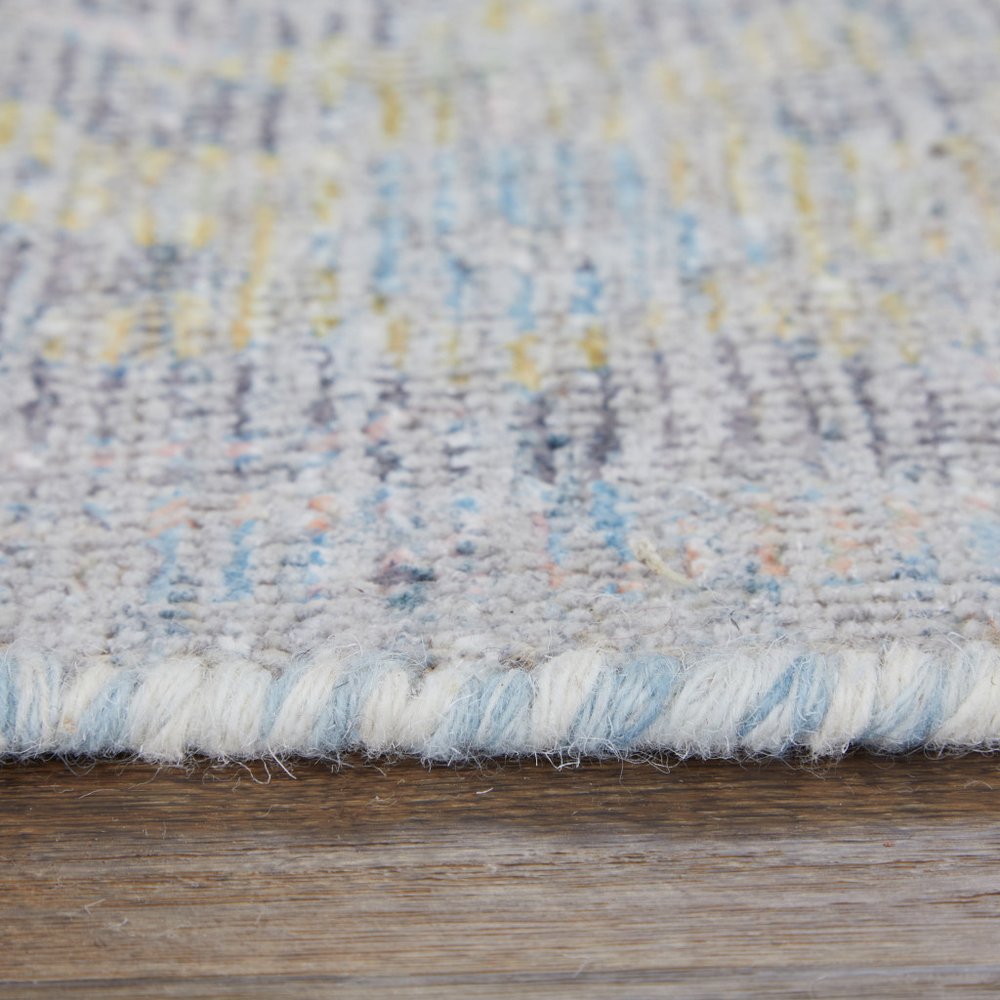 4' X 6' Orange Blue and Gold Floral Hand Woven Distressed Area Rug With Fringe