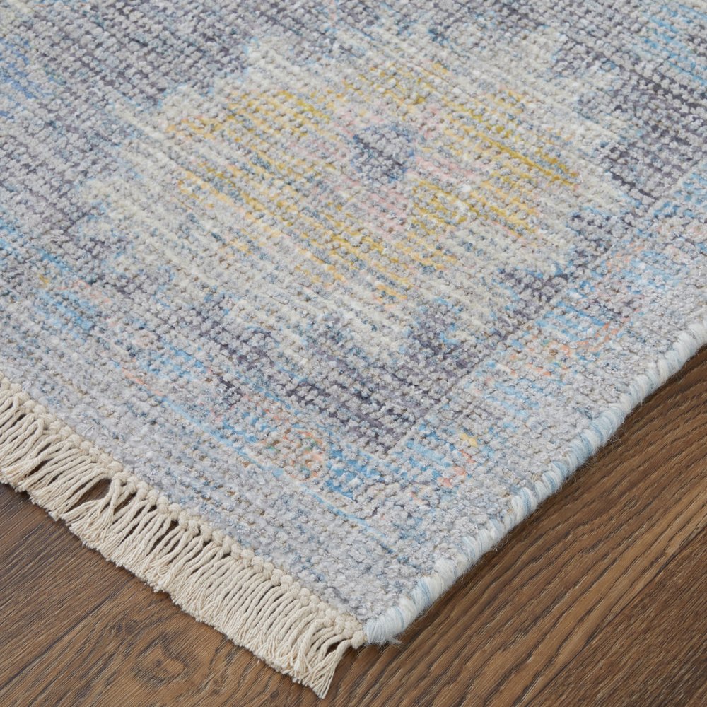 4' X 6' Orange Blue and Gold Floral Hand Woven Distressed Area Rug With Fringe